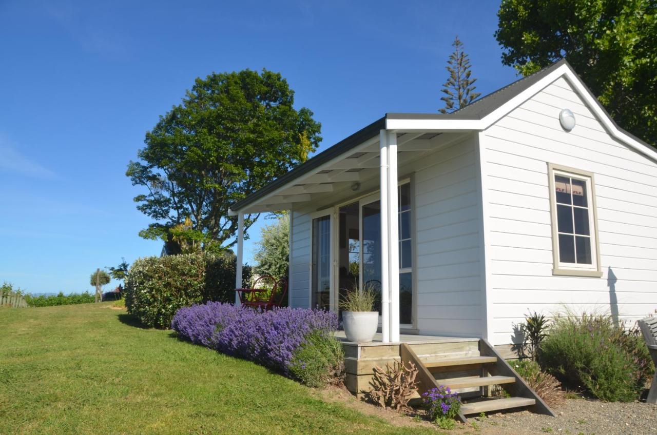 Kina Beach Cottages Tasman Екстер'єр фото