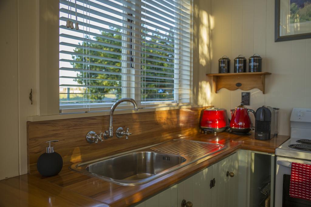Kina Beach Cottages Tasman Номер фото